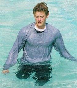 Swimming in clothes sweatshirt in pool