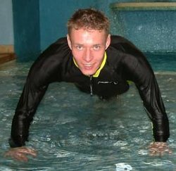 power training in pool with red anorak